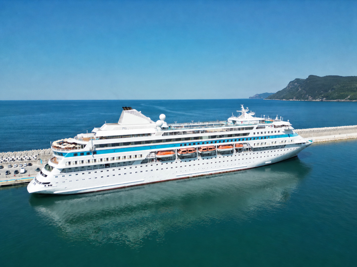 Cruise vessel sailing on the open sea